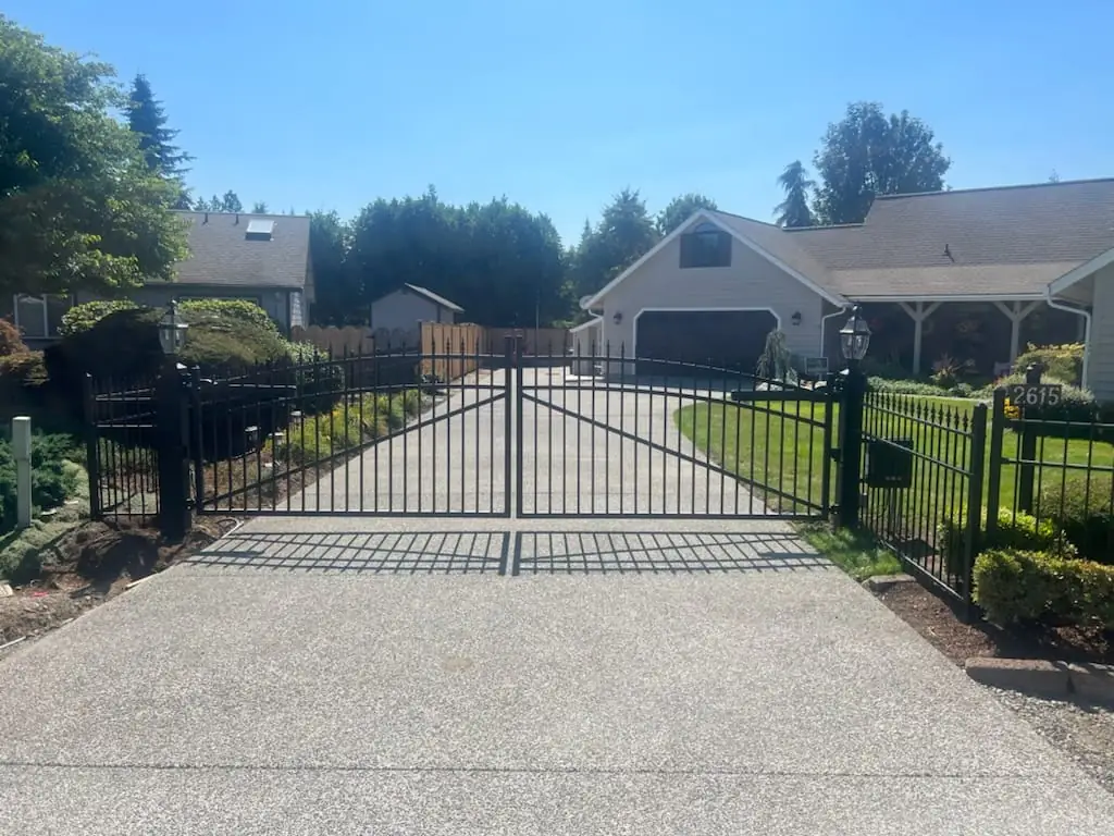 Automated double swing driveway gate installed at a Western Washington residence