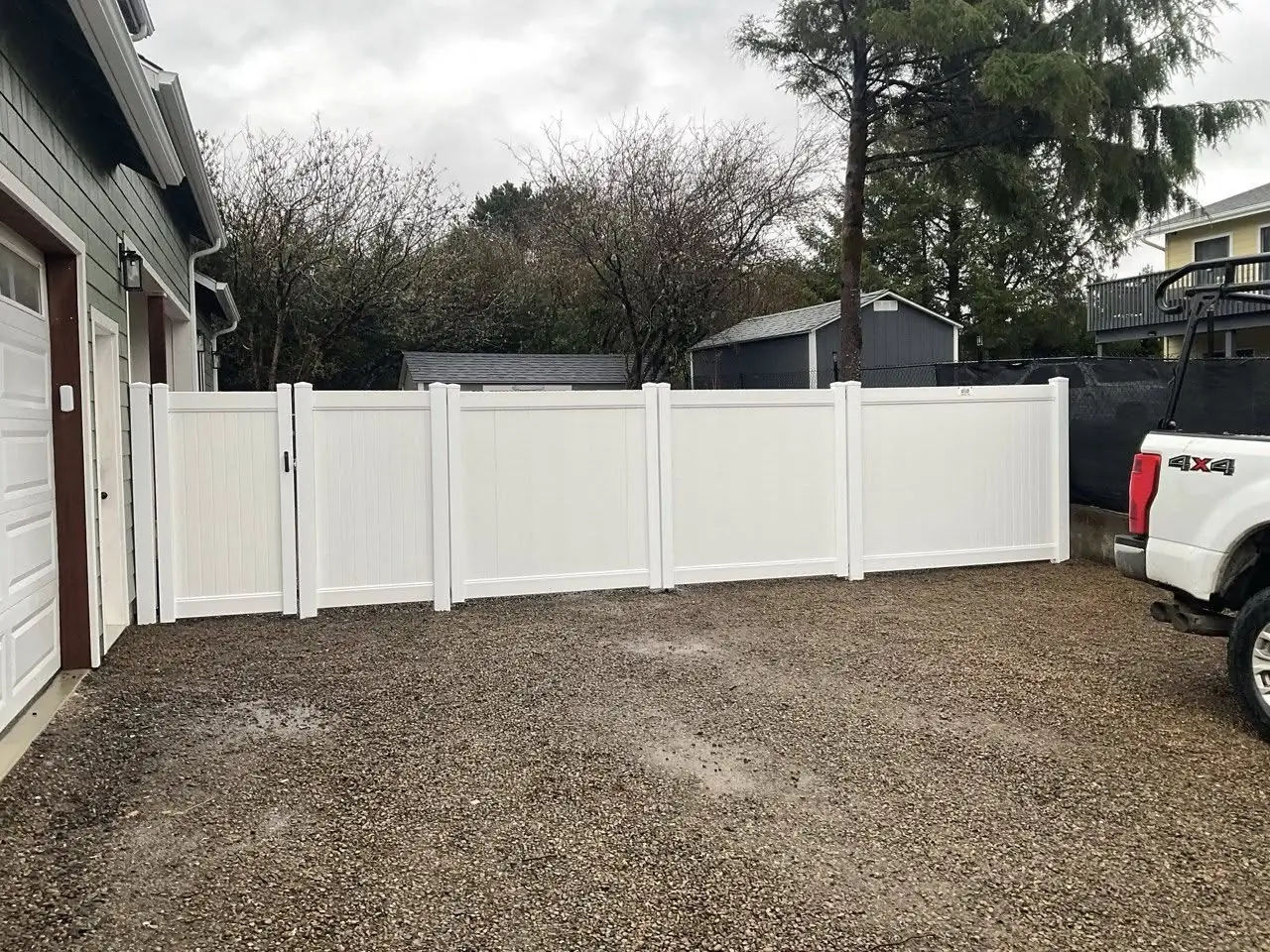 White Vinyl Privacy Fence with Gate